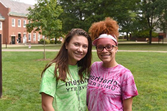 Photo of two female Chatham University students side by side, smiling